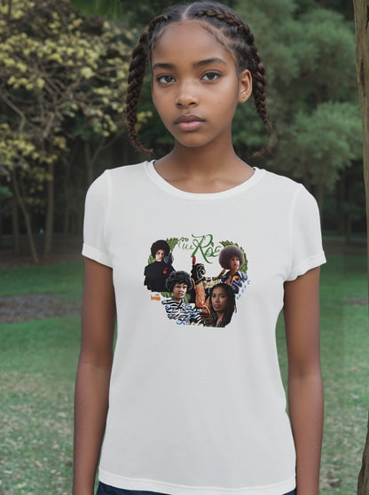 Woman standing strong in spiritual “May We Rise” tee made from sustainable fabric